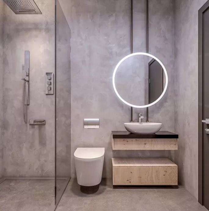 Banheiro industrial com detalhes em concreto e super contemporâneo.